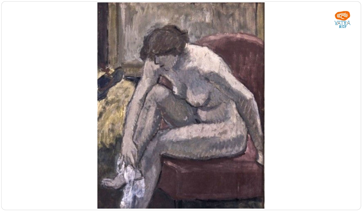 Nud pe fotoliu roșu