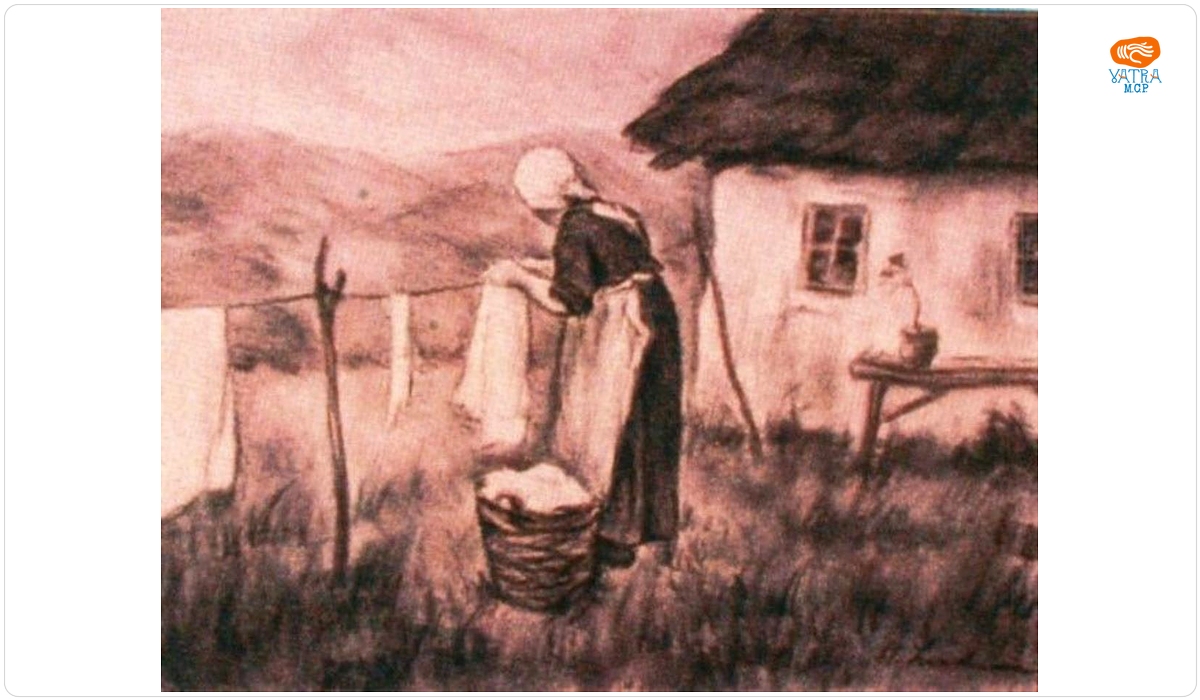 Femeie punând rufe la uscat