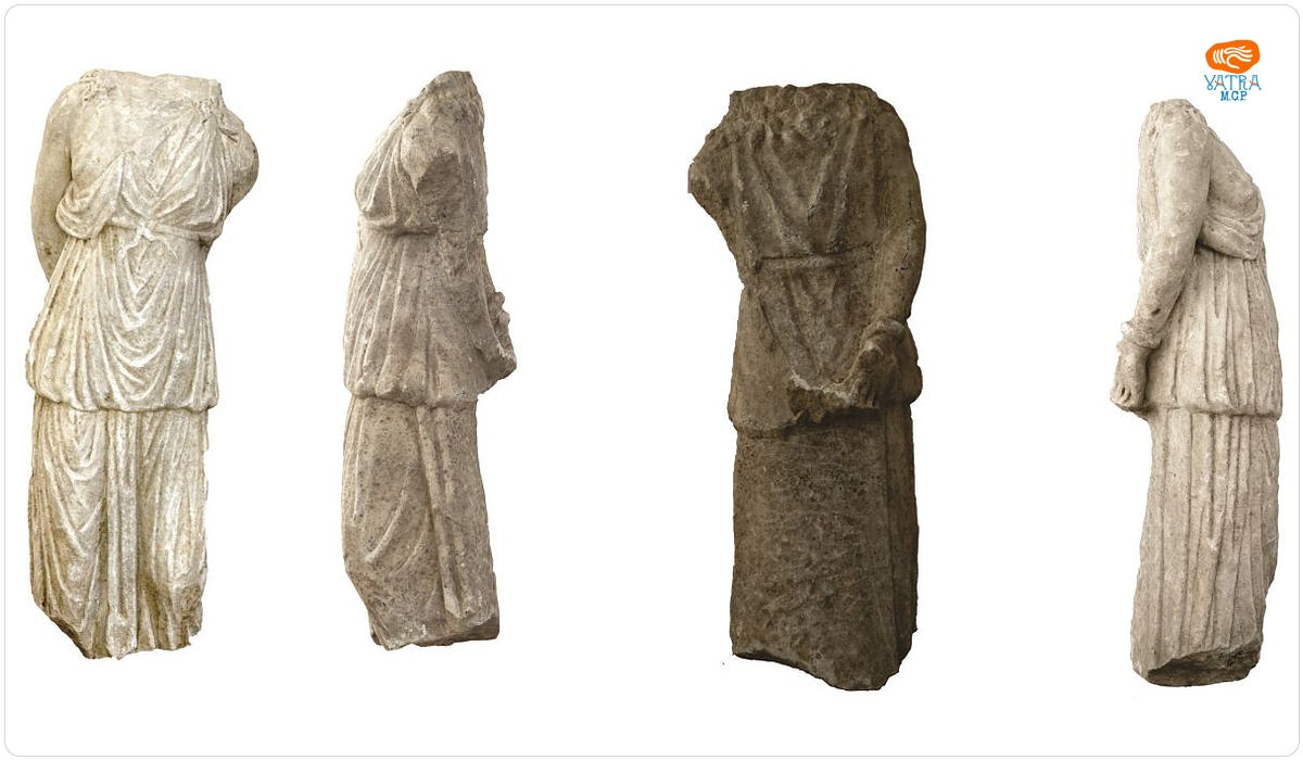 Statuie feminină drapată
